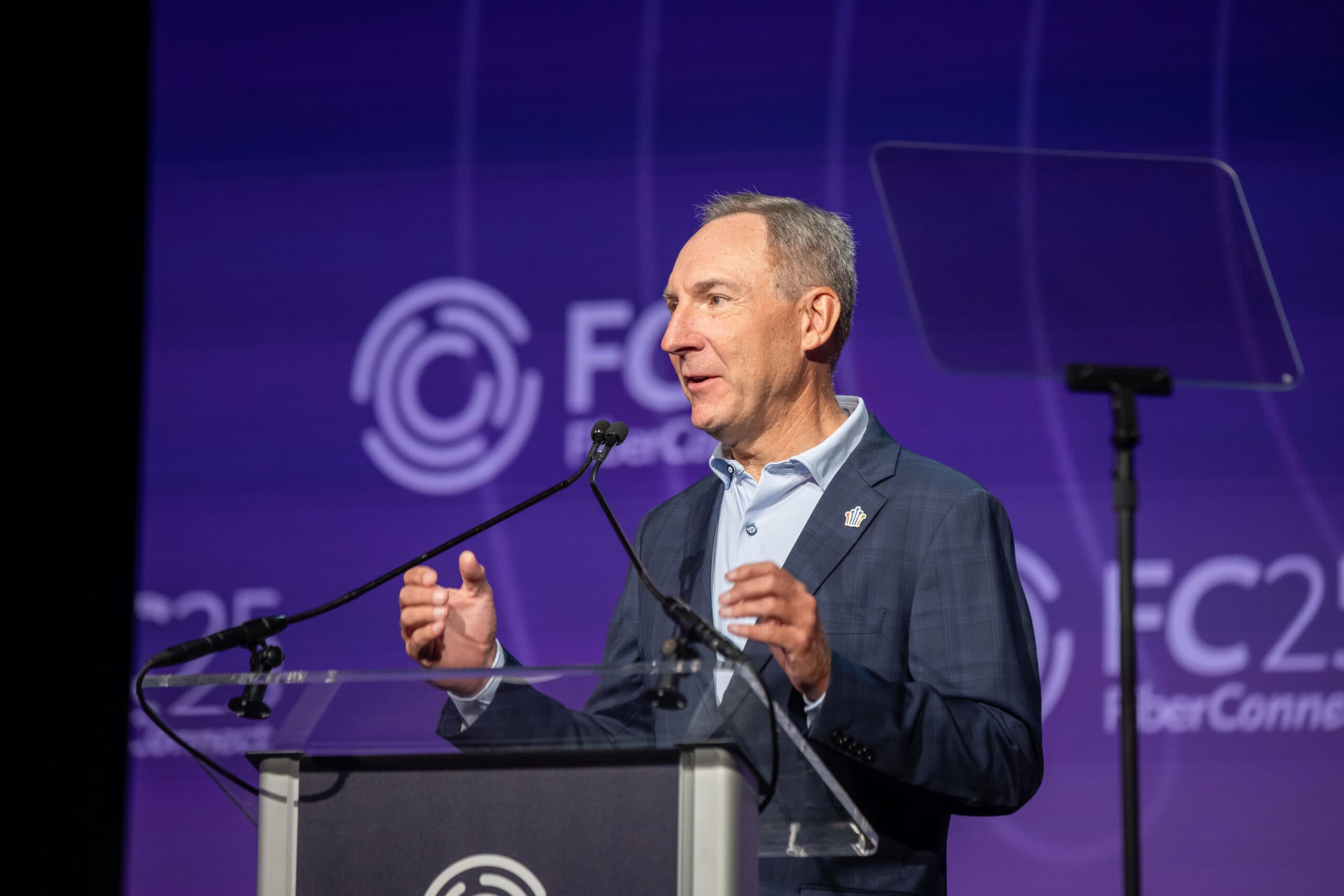 Man speaking at a podium